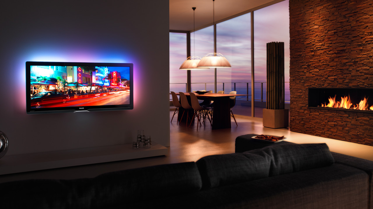 Backlit LCD Television Hanging On Wall