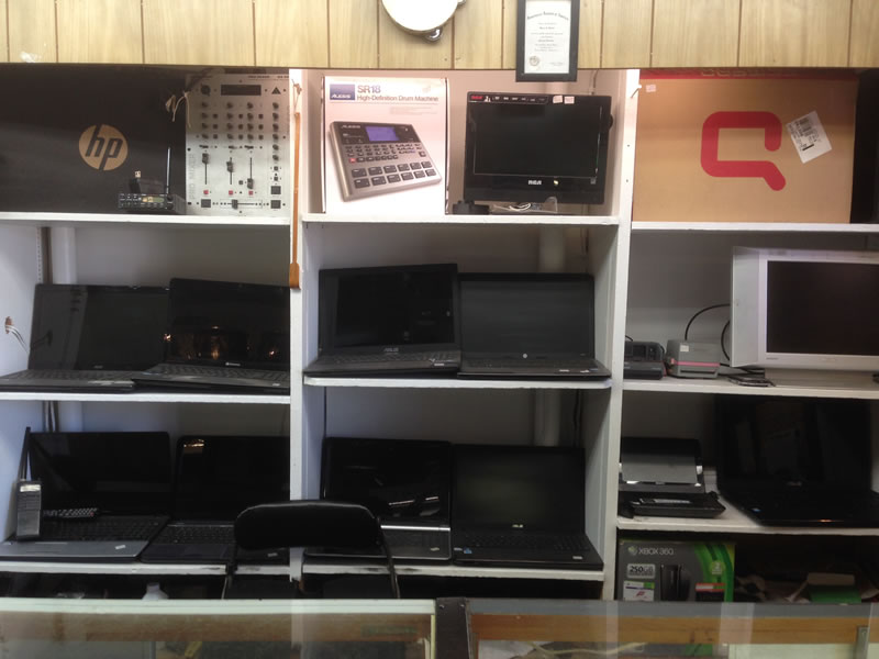Display Case With Laptops And Monitors