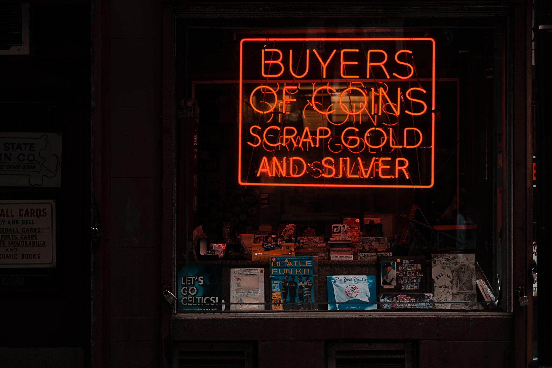 Neon Sign On The Window Of A Pawn Shop In Pittsburgh, PA Advertising That They Buy Coins, Gold, And Silver.